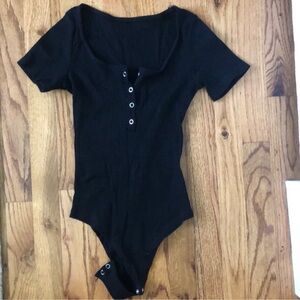 black shirt sleeve onesie